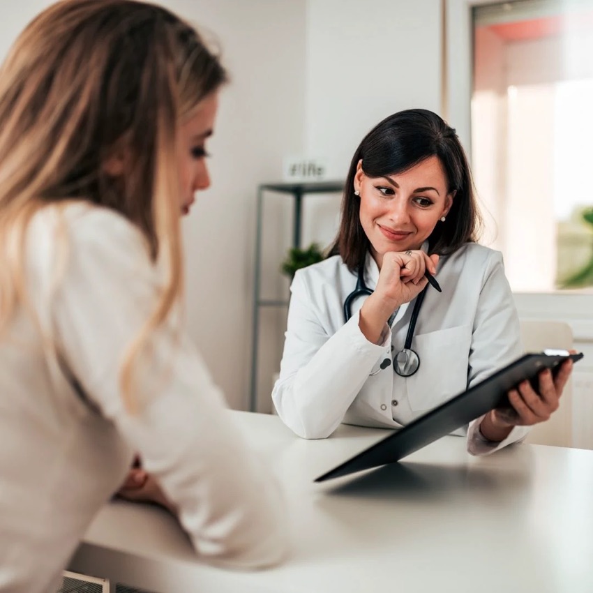 A patient talking with a doctor